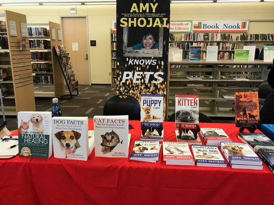 A "spread" of my books at a library book signing